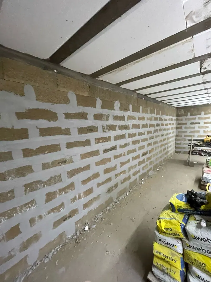 Les murs montés en blocs béton (Agrandissement sous terrasse, Villiers-Adam)