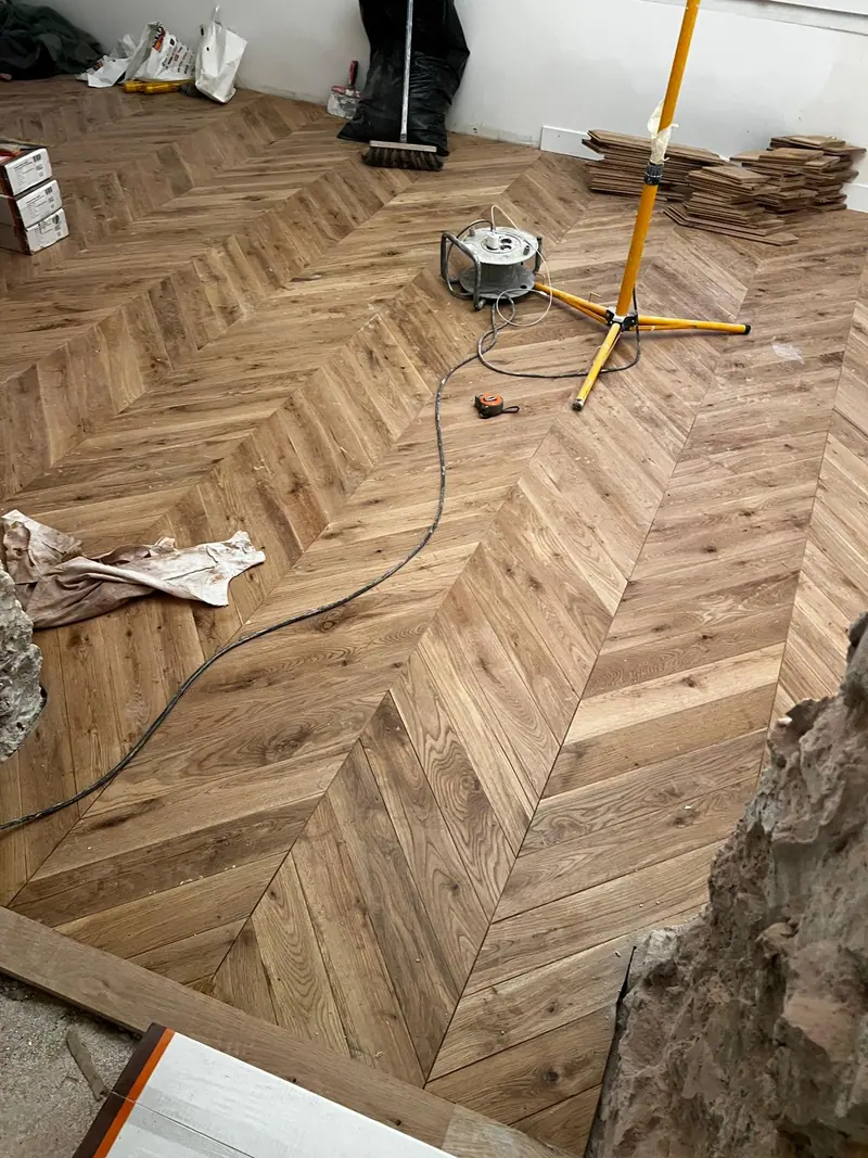 Pose du parquet (Rénovation complète d’un appartement, Paris)